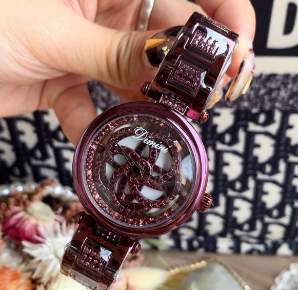 Foreign trade hot style watch female steel watch lady quartz watch to turn the windmill surface douyin the same