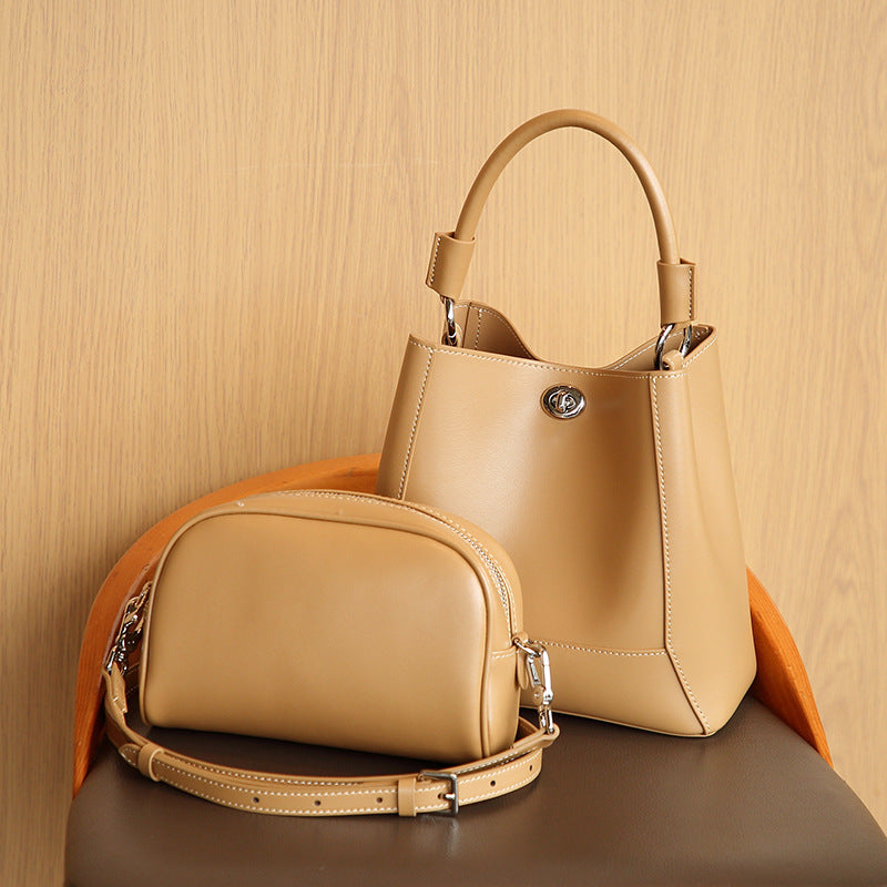 Structured Cowhide Bucket Bag with Turn-Lock Closure