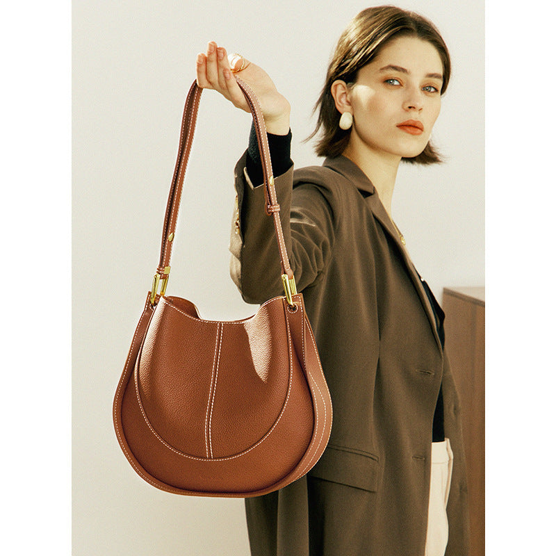 Curved Saddle Shoulder Bag in First-Layer Cowhide