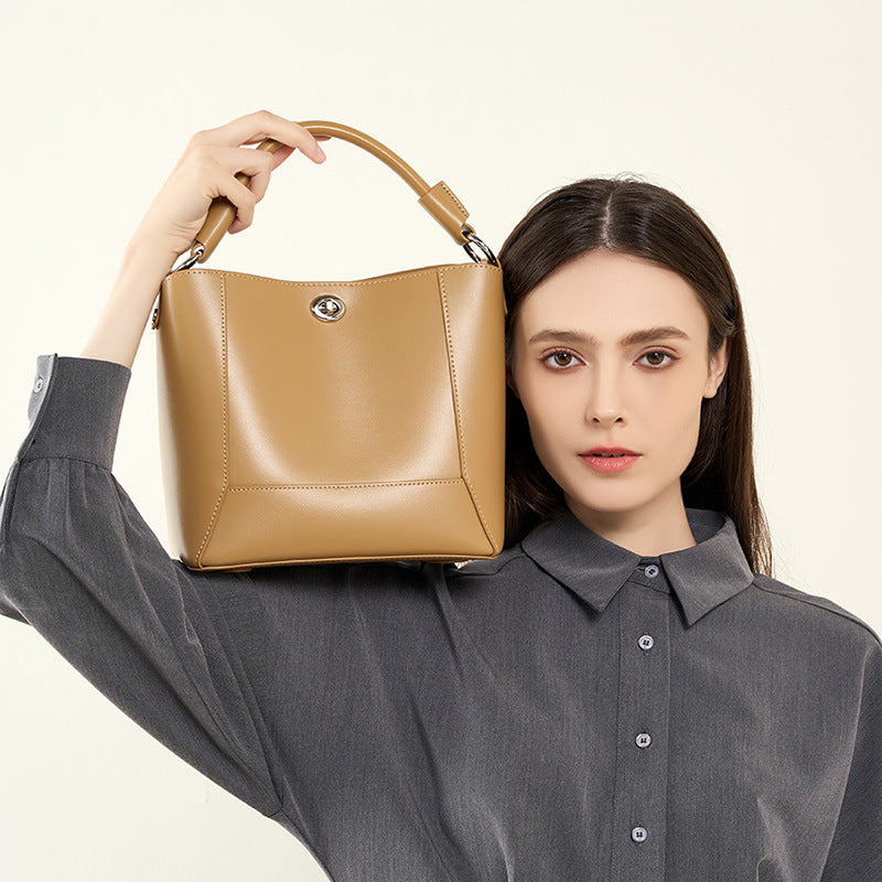 Structured Cowhide Bucket Bag with Turn-Lock Closure